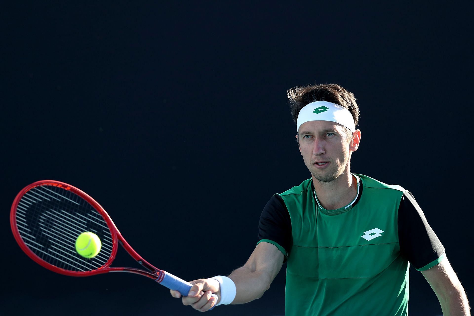 Sergiy Stakhovsky plays a forehand volley