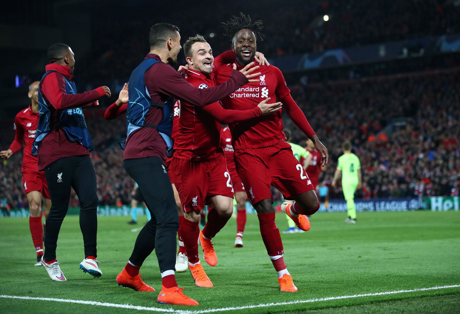 Origi (right) has become a hero at Anfield
