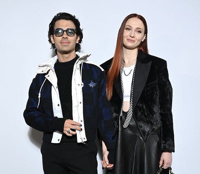 Emma Stone and Julianne Moore attending the Louis Vuitton Womenswear  Fall/Winter 2022/2023 show as