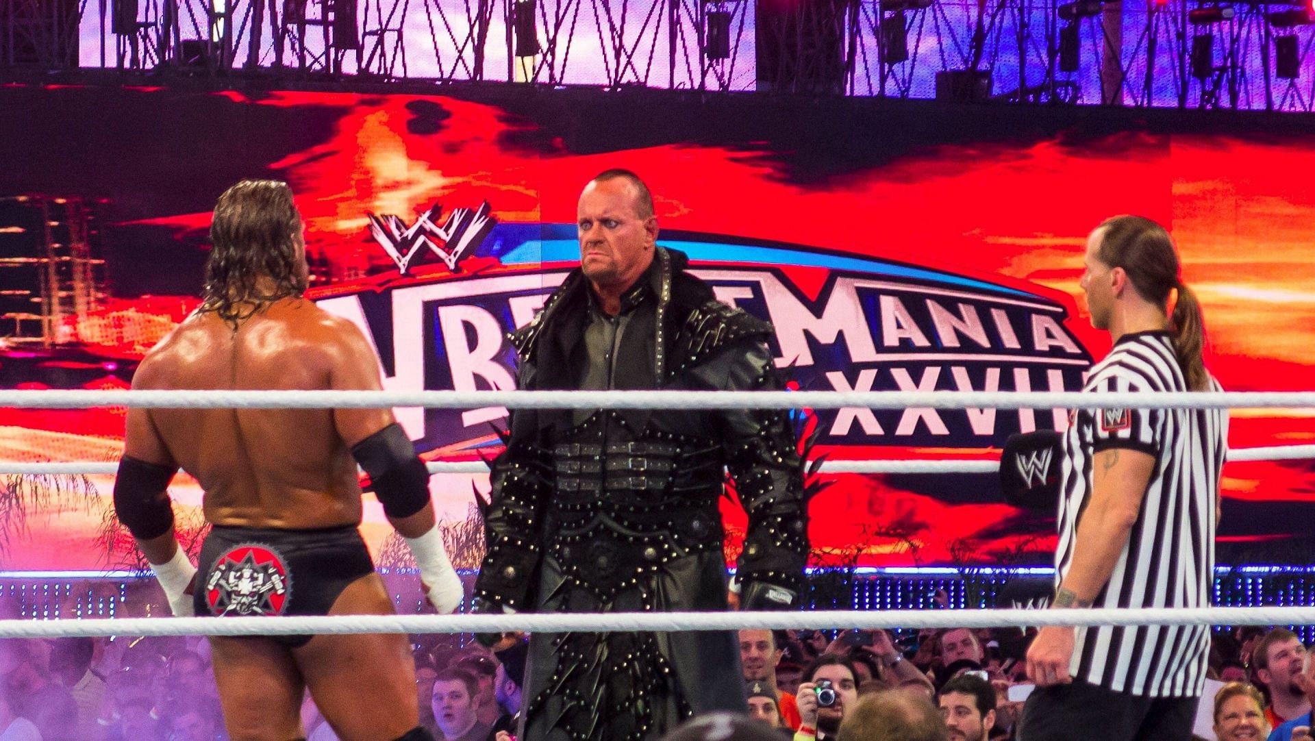 Undertaker faced Triple H at WrestleMania XXVII With Shawn Michaels as Guest Referee.