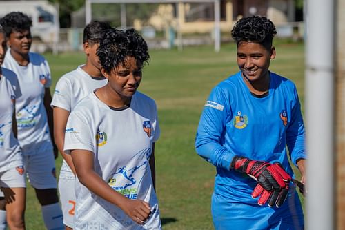 FC Goa Women's team goalkeeper Josline D'Souza with her teammates. (Image Courtesy: FC Goa)