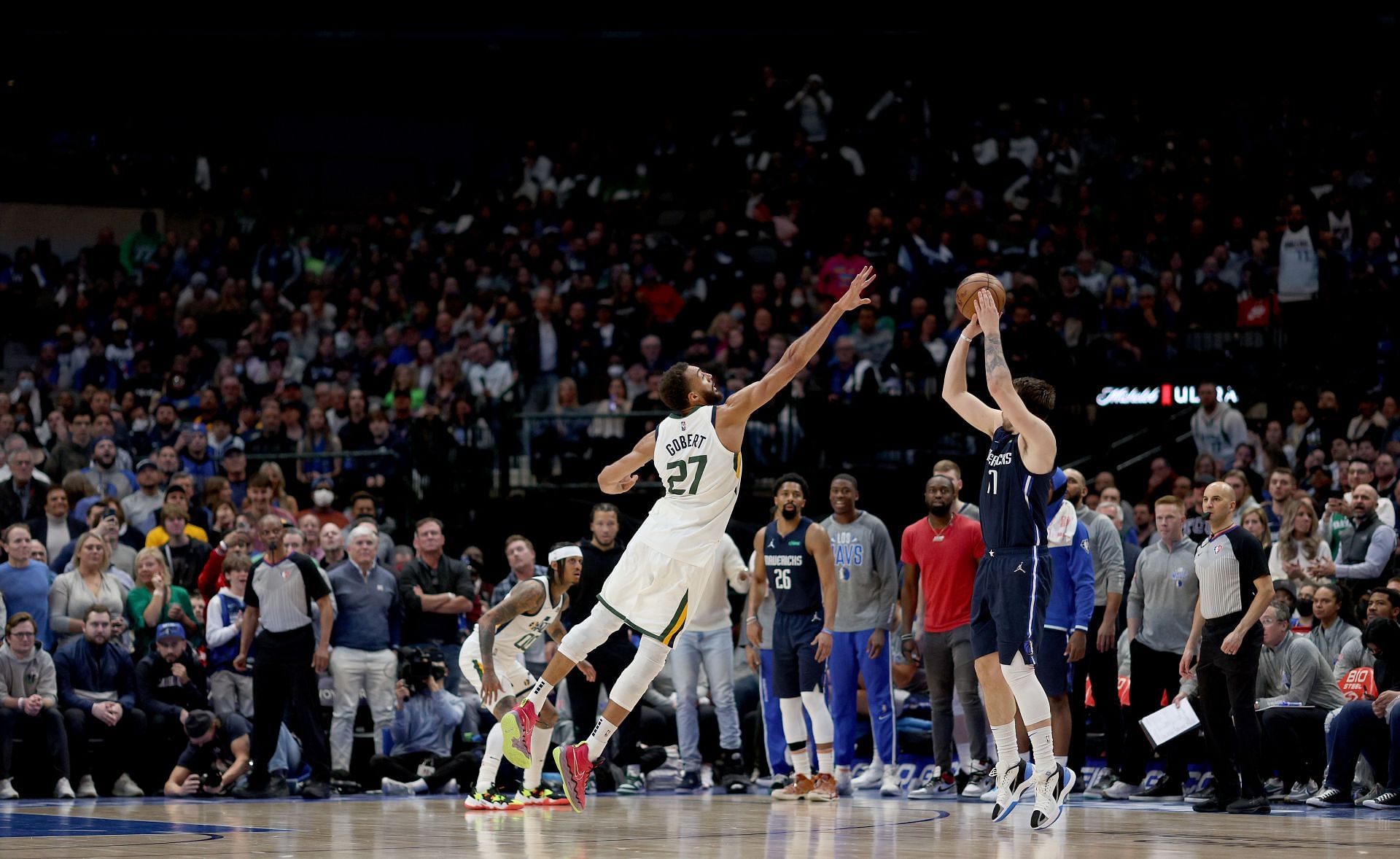 Dallas Mavericks star Luka Doncic shoots a 3-pointer over Utah Jazz center Rudy Gobert.