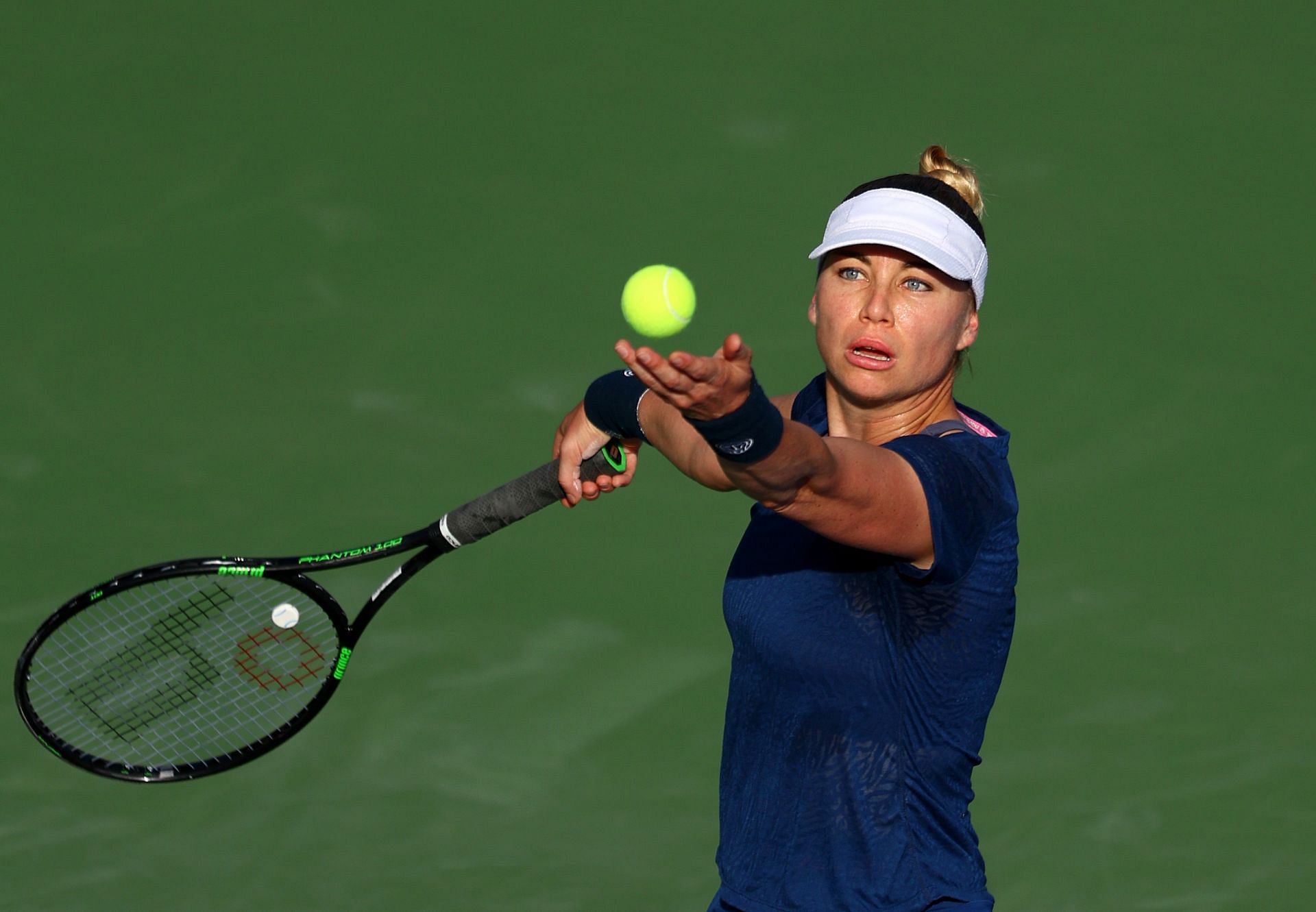 Vera Zvonareva serves at the Dubai Duty Free Tennis Championships