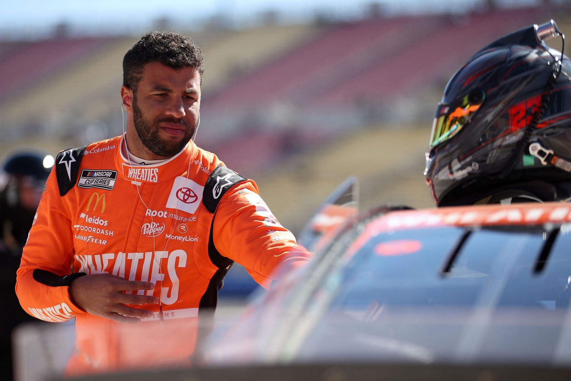 Bubba Wallace Jr. prepares for the NASCAR Cup Series Wise Power 400 at Auto Club Speedway.