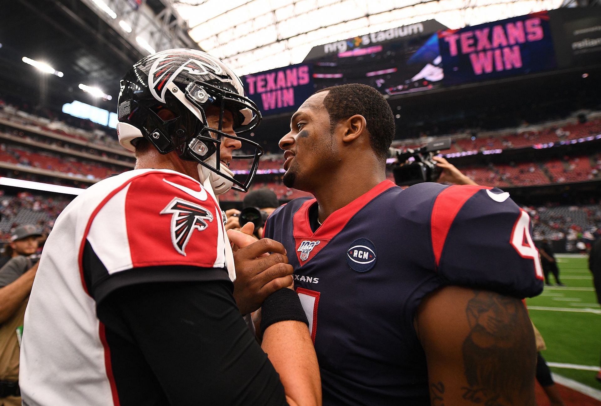 Houston Texans quarterback Deshaun Watson with Atlanta Falcons quarterback Matt Ryan