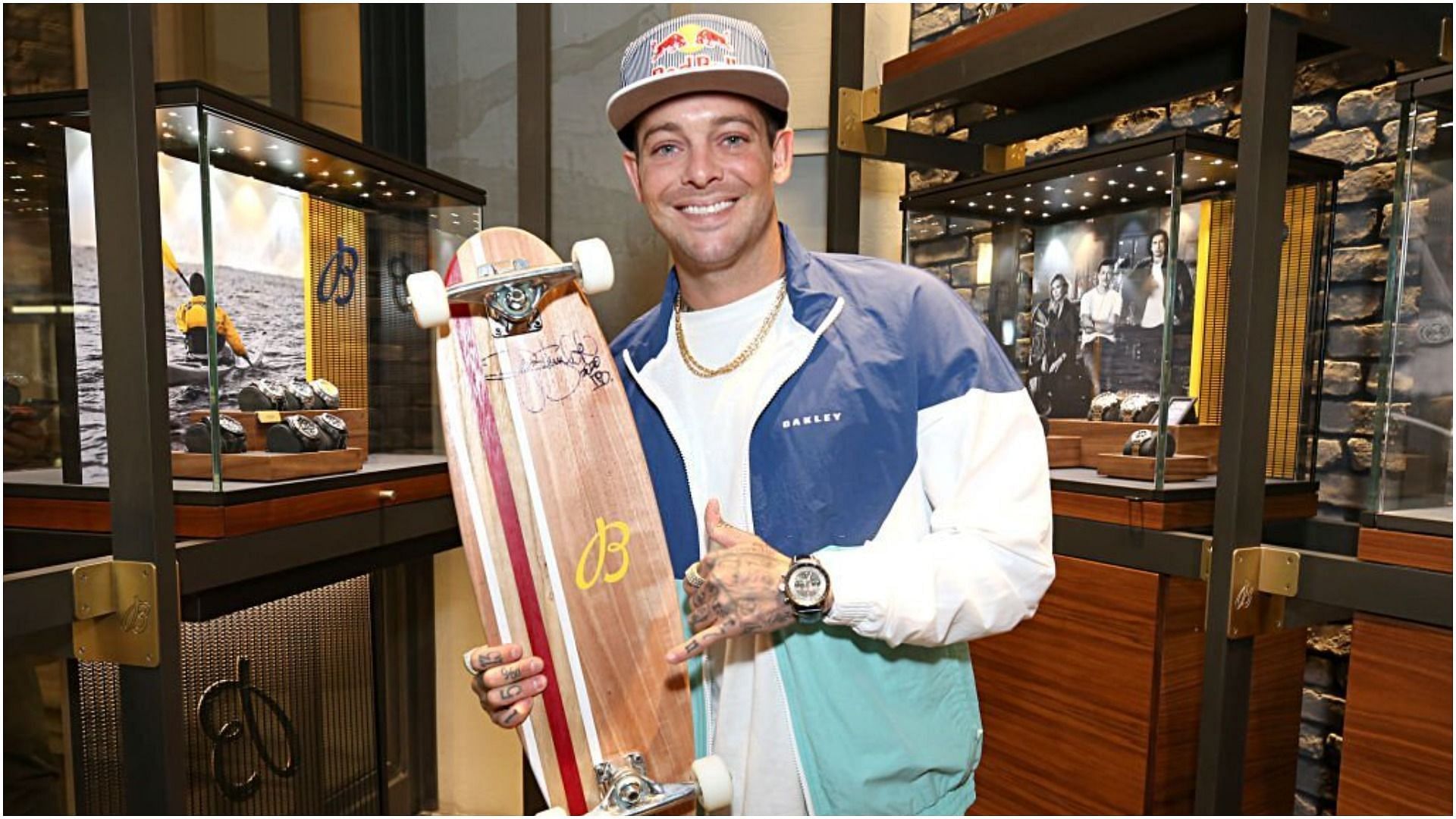 yan Sheckler attends the Breitling Boutique San Diego grand opening celebration (Image via Phillip Faraone/Getty Images)