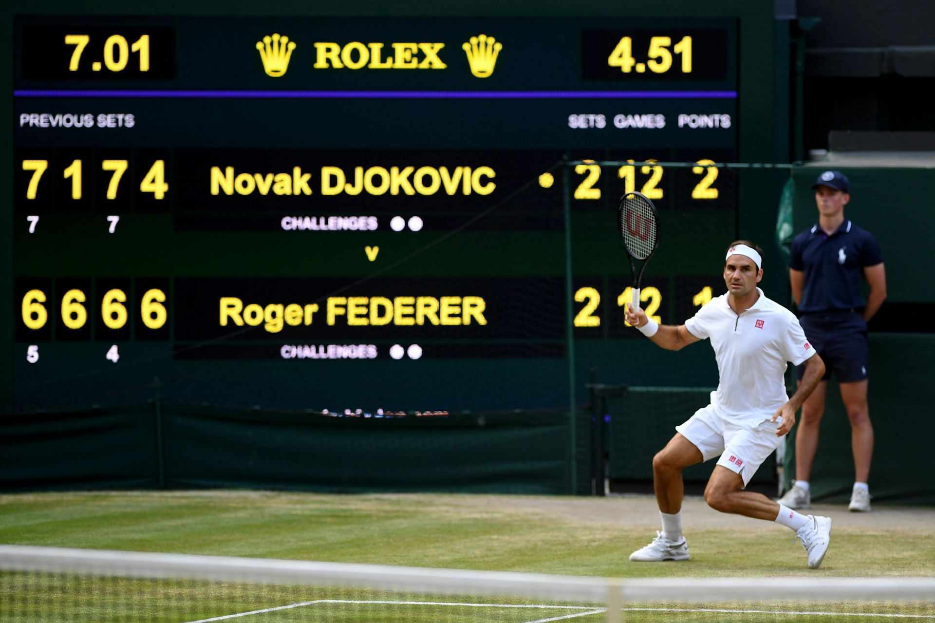 Roger Federer taking on Novak Djokovic at the Wimbledon 2019 final