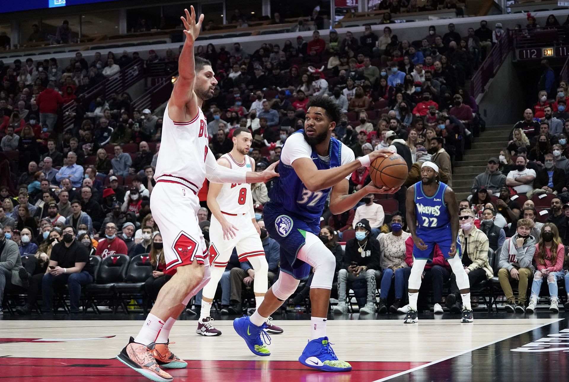 Chicago Bulls&#039; Nikola Vucevic guards Karl-Anthony Towns on the baseline