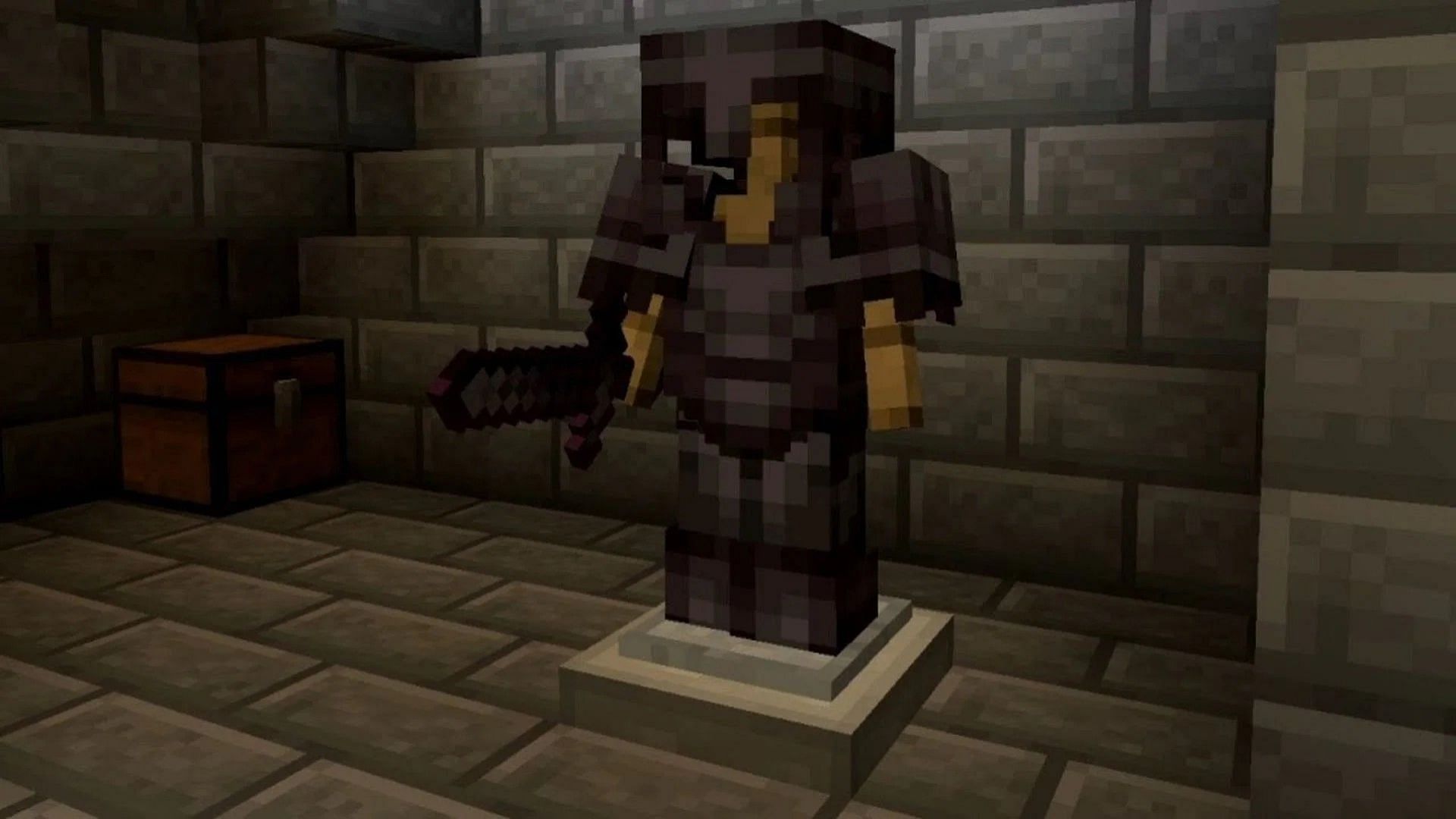 Netherite armor rests upon an armor stand in Minecraft (Image via AserGaming/YouTube)