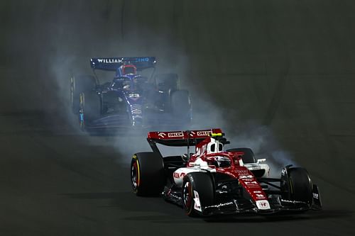 Alfa Romeo questioned the consistency of the penalty given to Guanyu Zhou (front) after he went off the track while overtaking Alex Albon (behind)