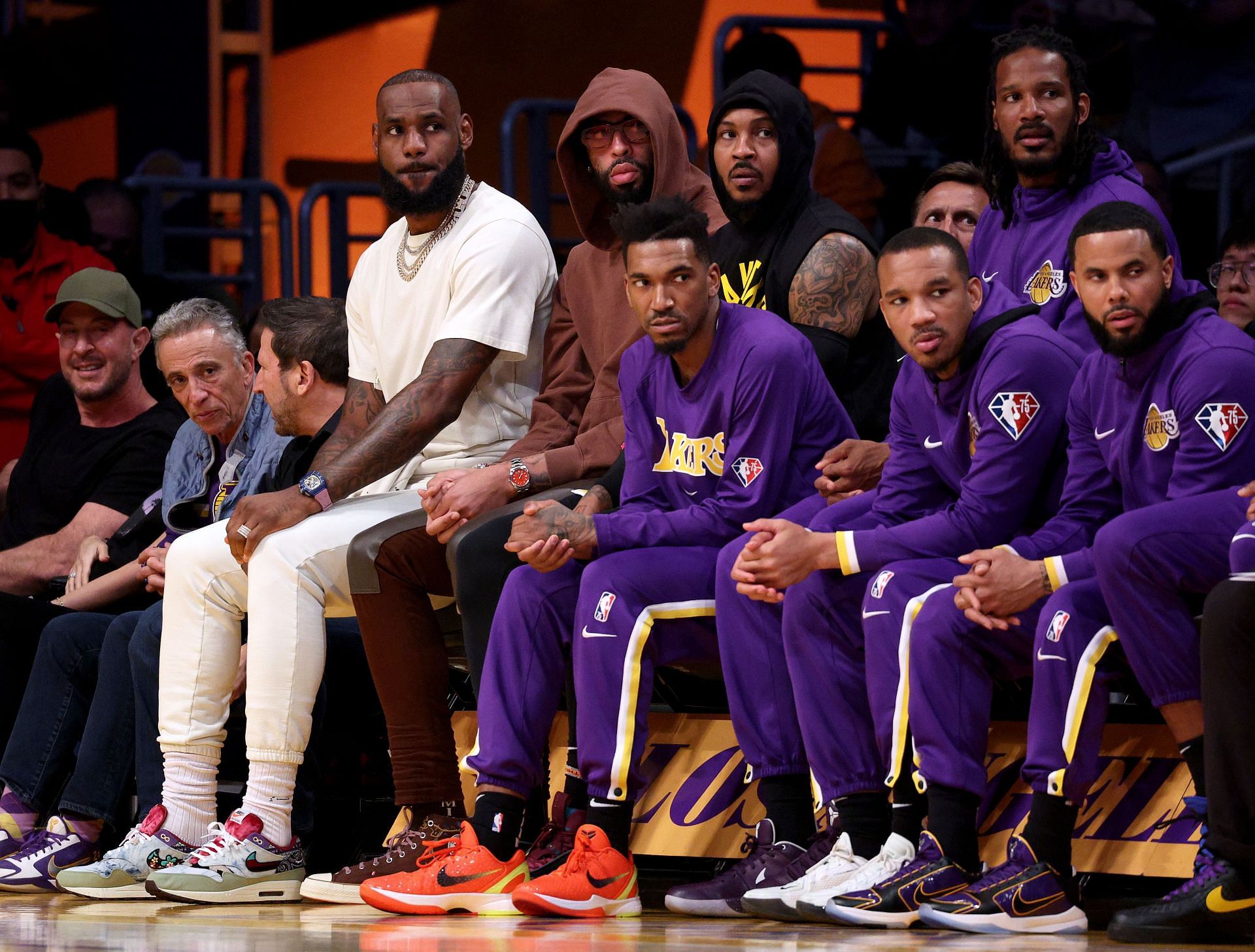 LeBron James, Anthony Davis and Carmelo Anthony of the LA Lakers on the bench