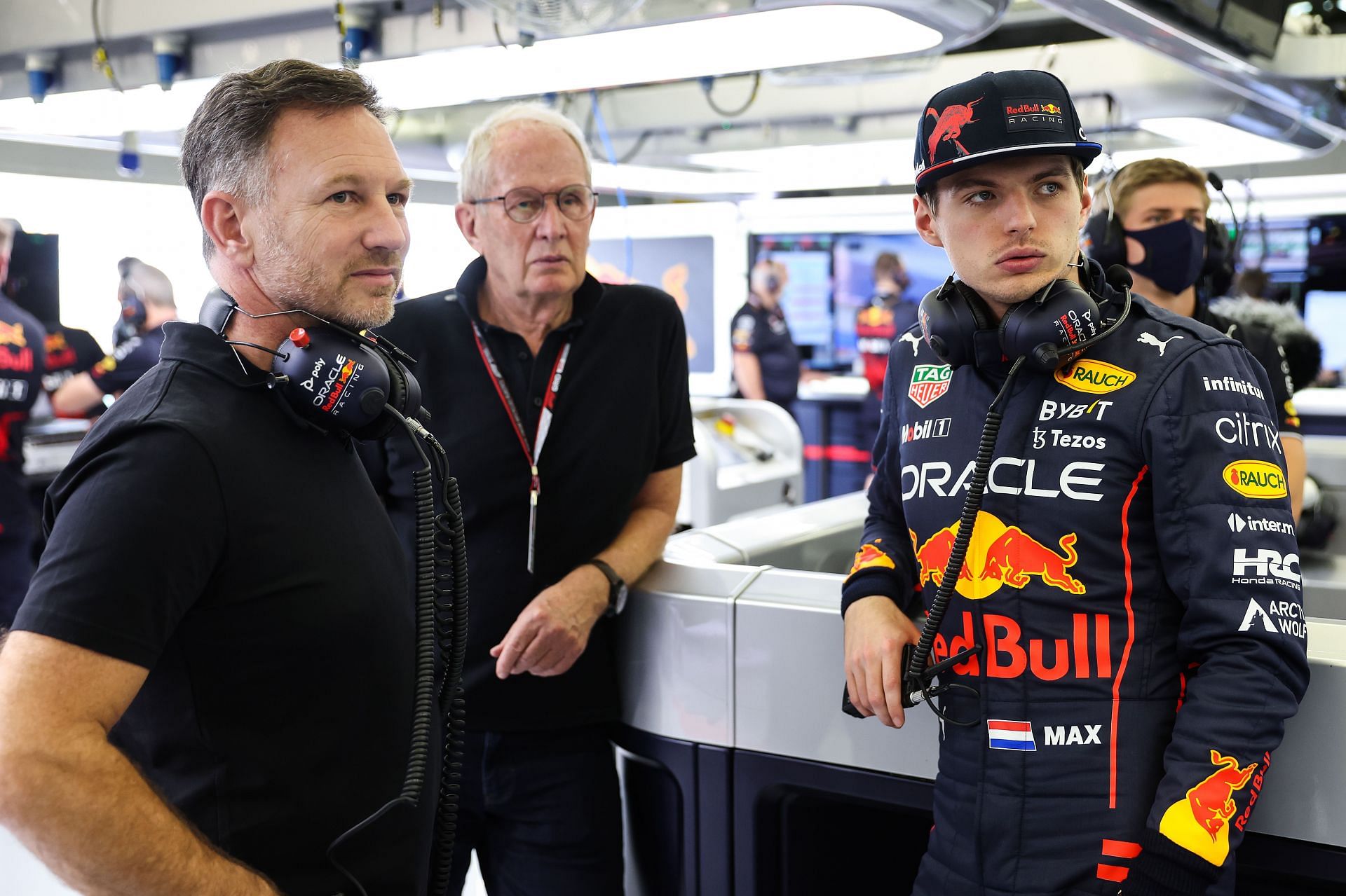 (L to R) Red Bull Racing&#039;s team principal Christian Horner, team consultant Dr. Helmut Marko and Max Verstappen in the garage during Day 1 of F1 Testing in Bahrain (Photo by Mark Thompson/Getty Images)