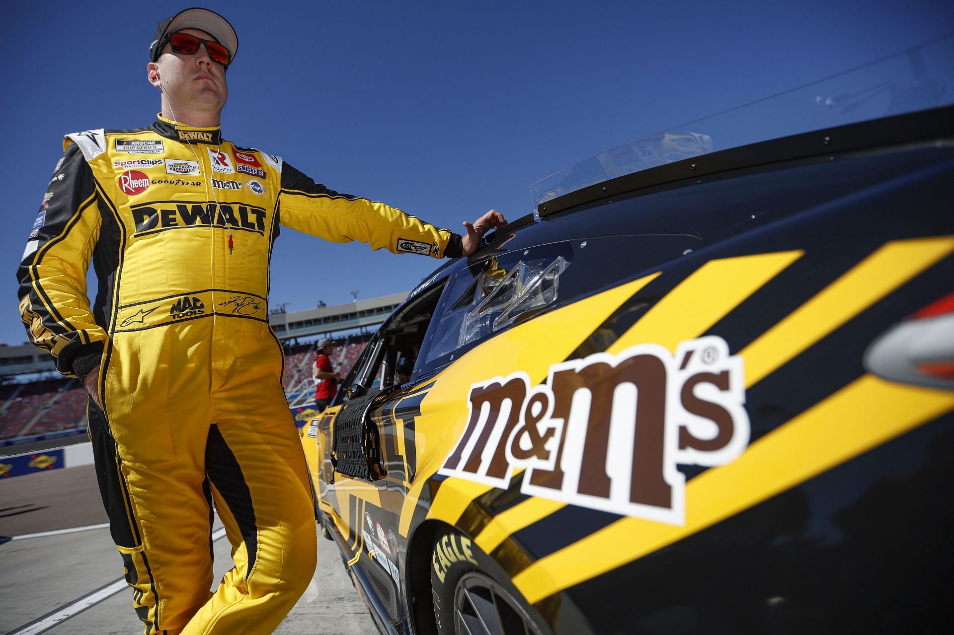 Kyle Busch waits on the grid during practice for the Ruoff Mortgage 500 at Phoenix Raceway