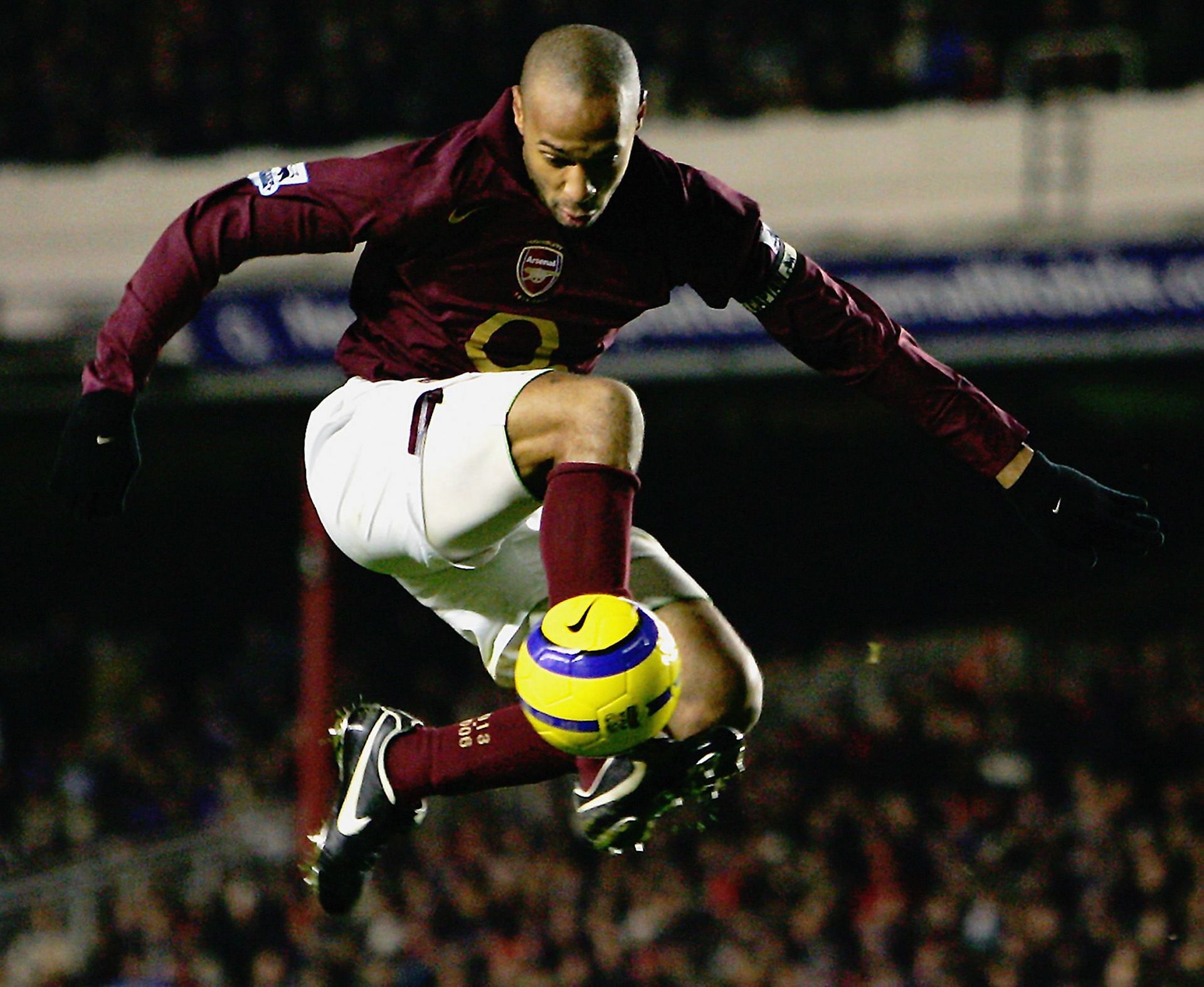 Henry in action in Arsenal v Portsmouth