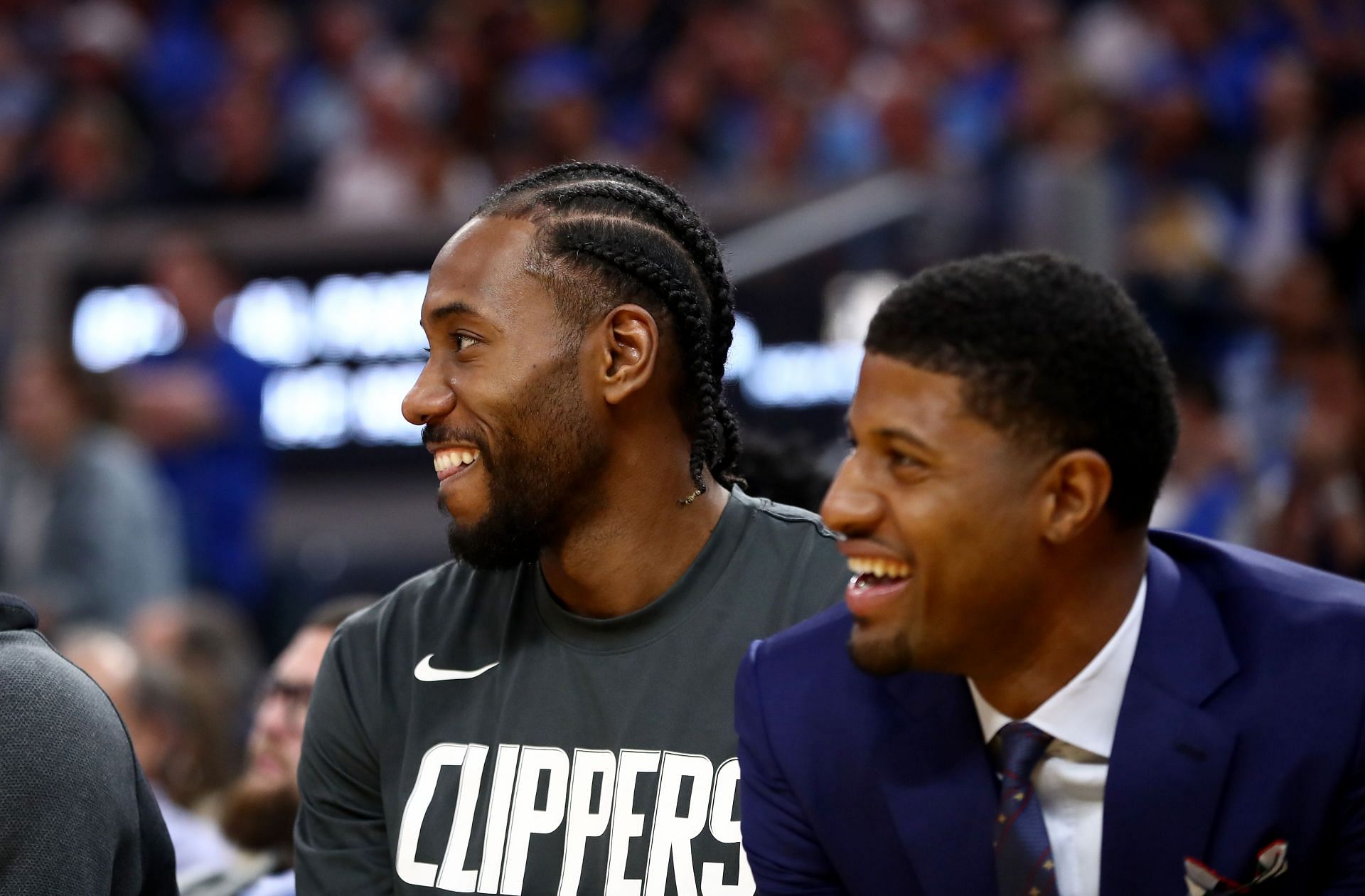 Kawhi Leonard and Paul George on the bench during the Los Angeles Clippers games v Golden State Warriors