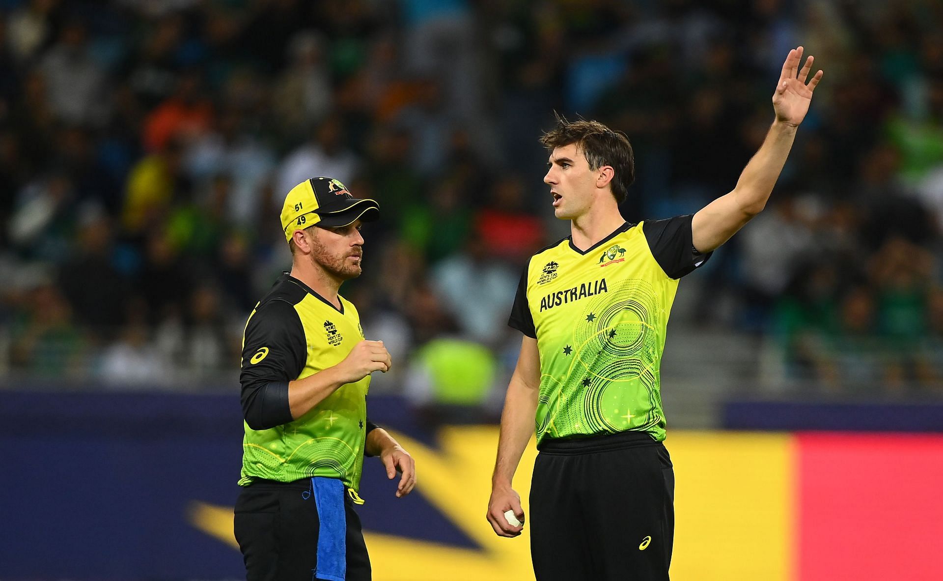KKR will be without the services of Aaron Finch (L) and Pat Cummins (R) in the first two weeks