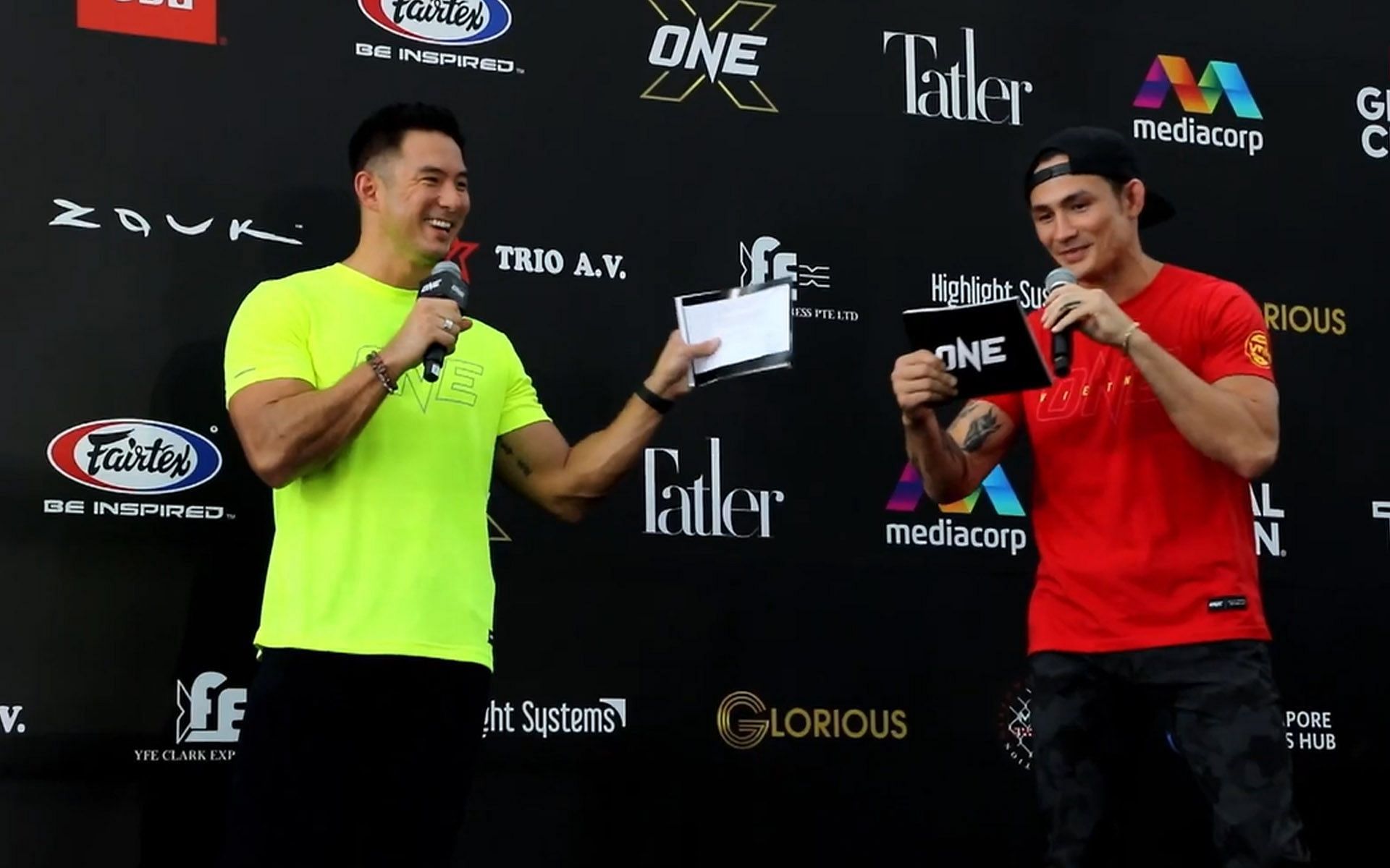 Thanh Le (R) did some hosting alongside Dom Lau at the ONE X open workouts. | [Photo: Cageside Press on YouTube]