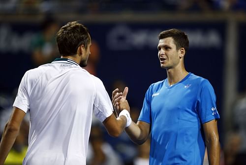 Hubert Hurkacz and Daniil Medvedev(L)