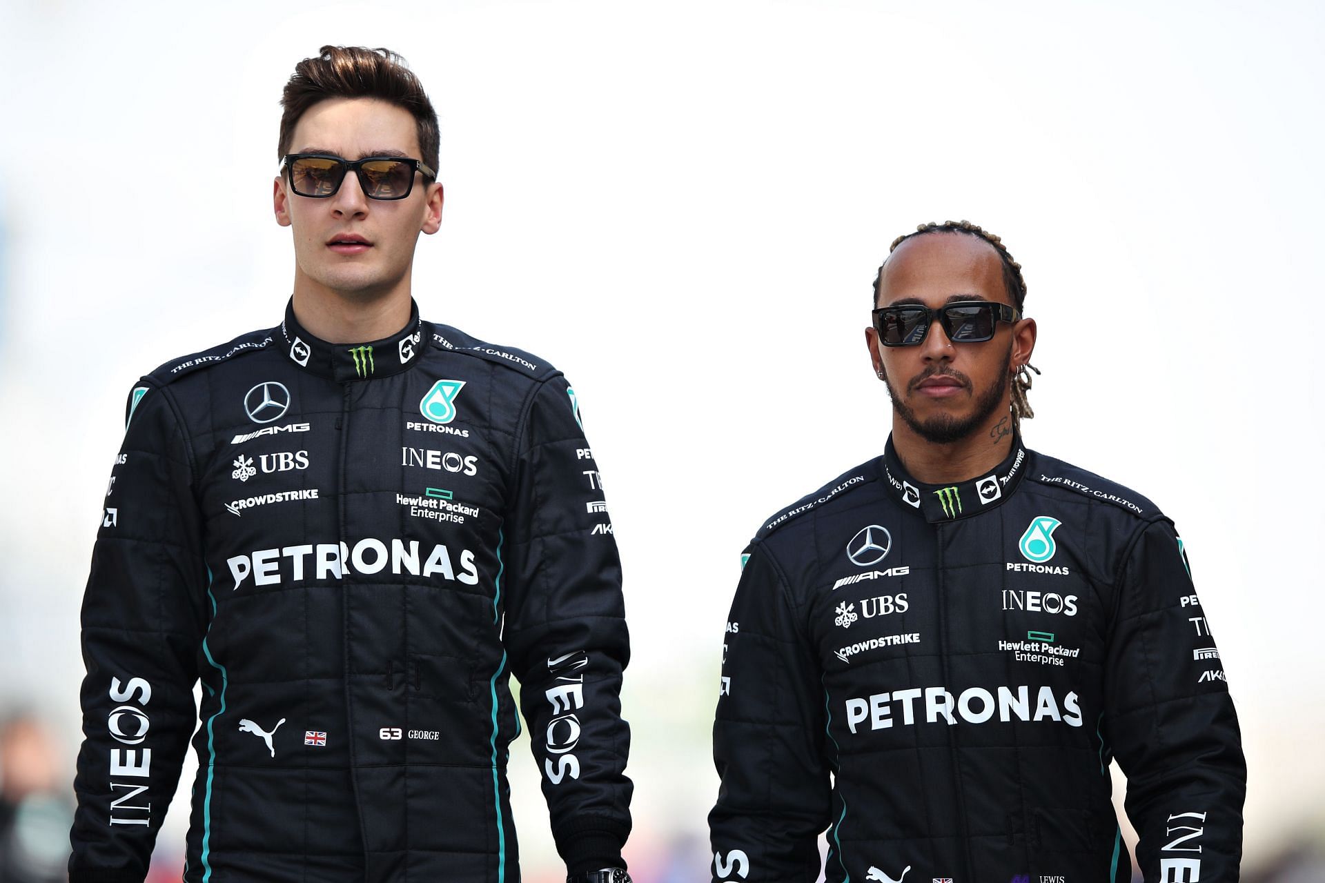 George Russell (left) with Lewis Hamilton during Formula 1 Testing in Bahrain - Day 1