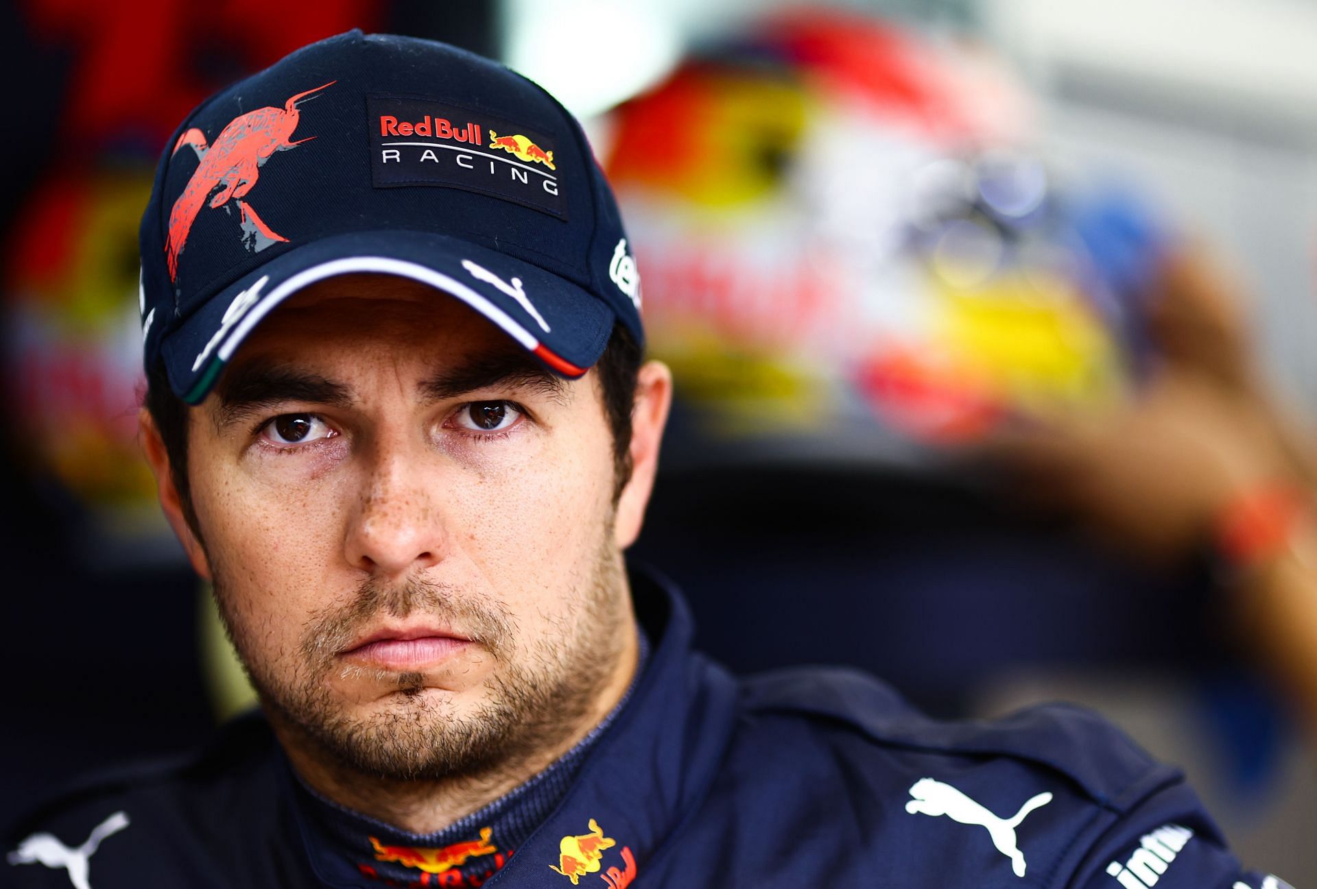 Sergio Perez looks on in the garage during qualifying ahead of the 2022 Saudi Arabian GP (Photo by Mark Thompson/Getty Images)