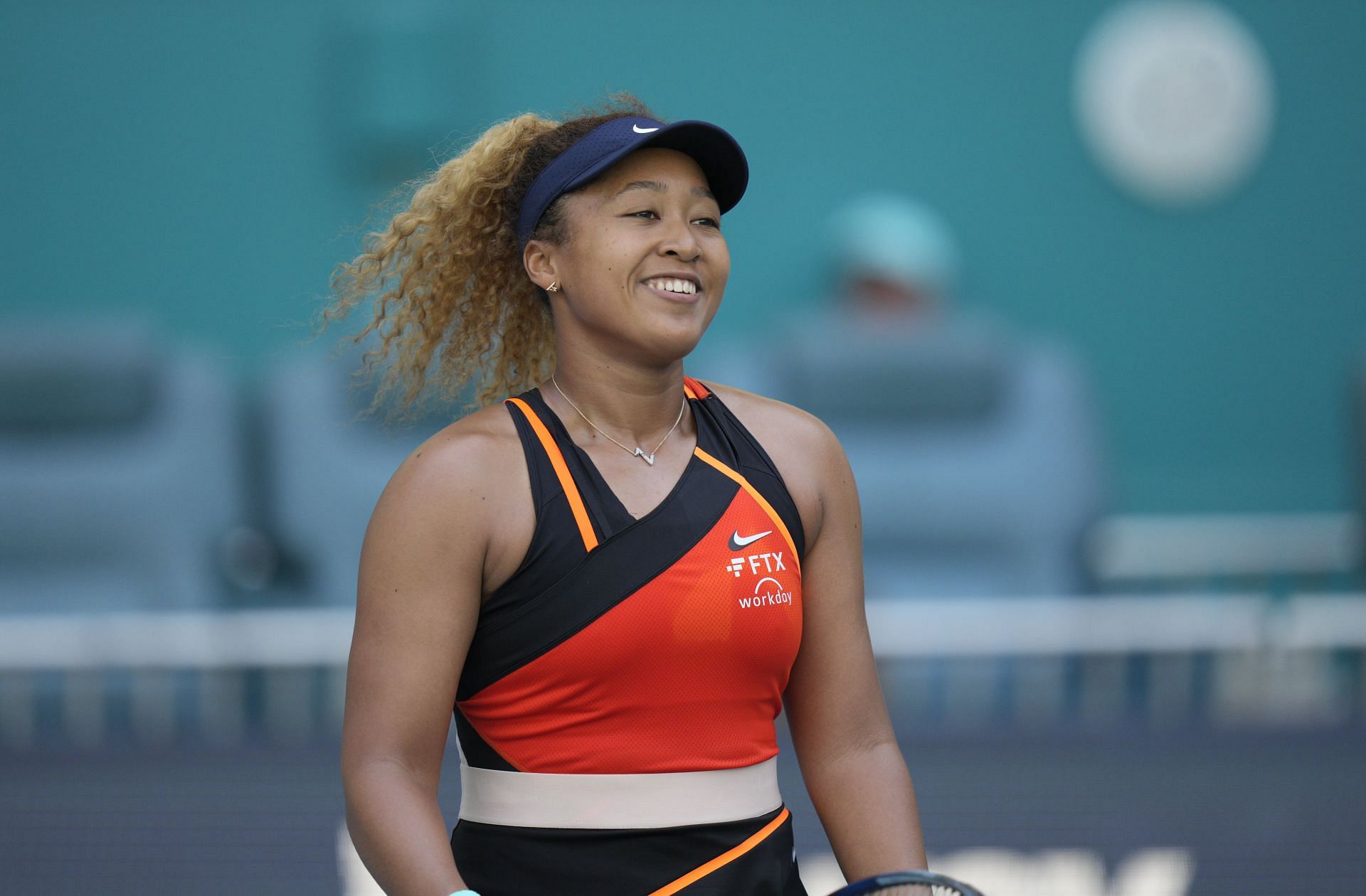 Naomi Osaka smiles during her fourth-round match at the 2022 Miami Open