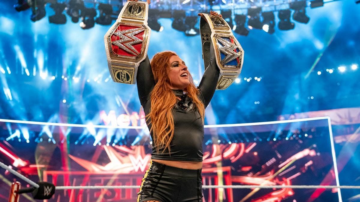 Becky Lynch celebrating the birth of Becky Two Belts at WrestleMania 35
