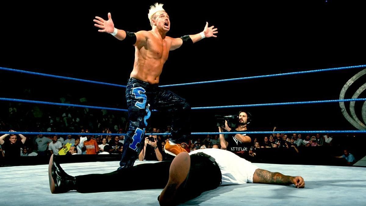Scotty 2 Hotty ready to do the worm dance during a match on SmackDown!
