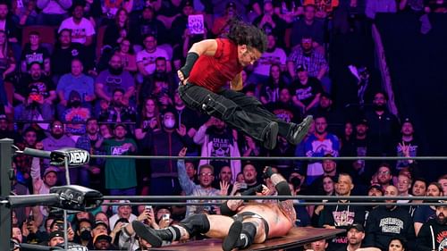 Matt Hardy delivering his signature diving-leg-drop onto The Butcher.