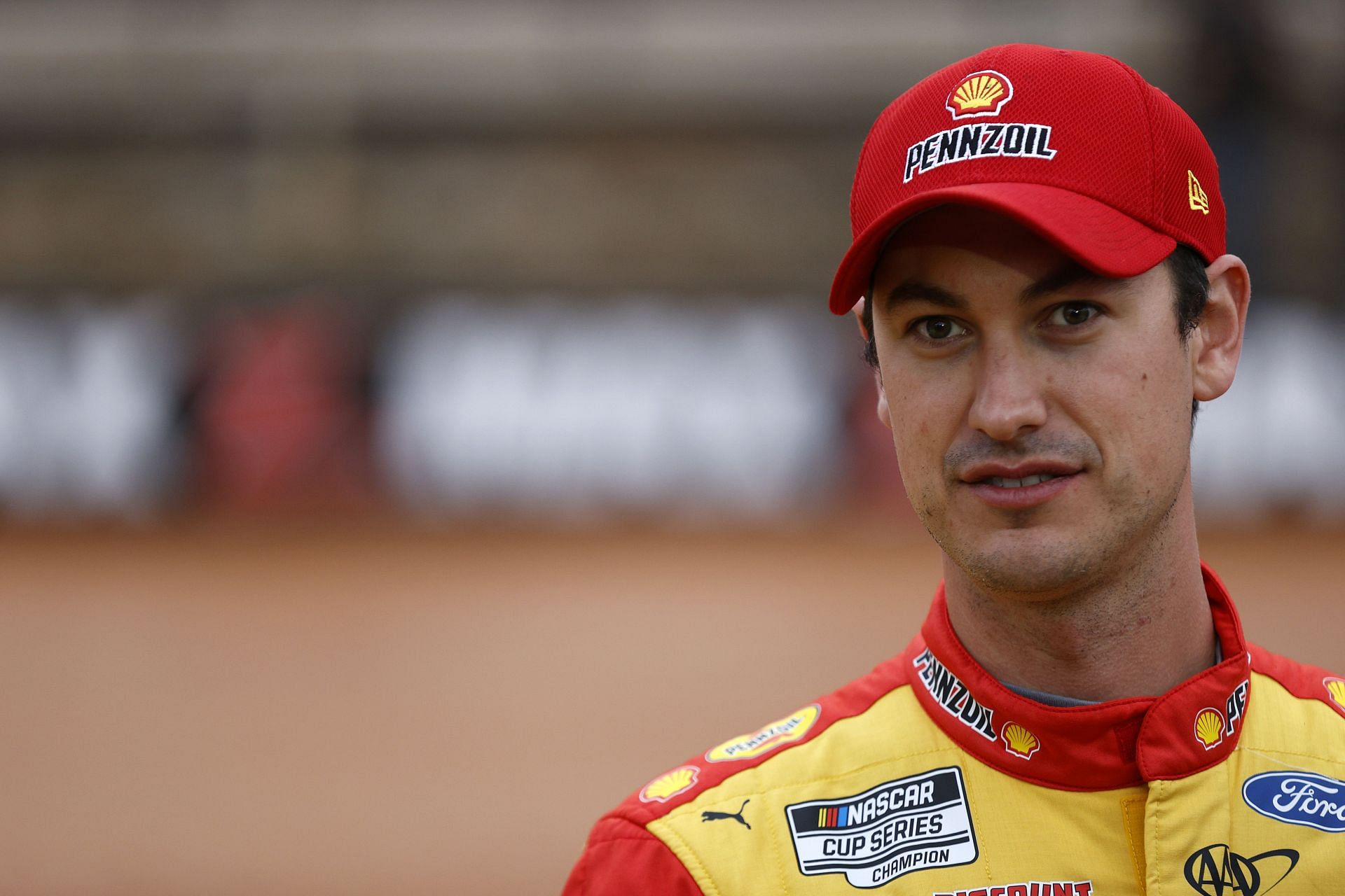 Joey Logano waits on the grid prior to the NASCAR Cup Series Food City Dirt Race at Bristol Motor Speedway.