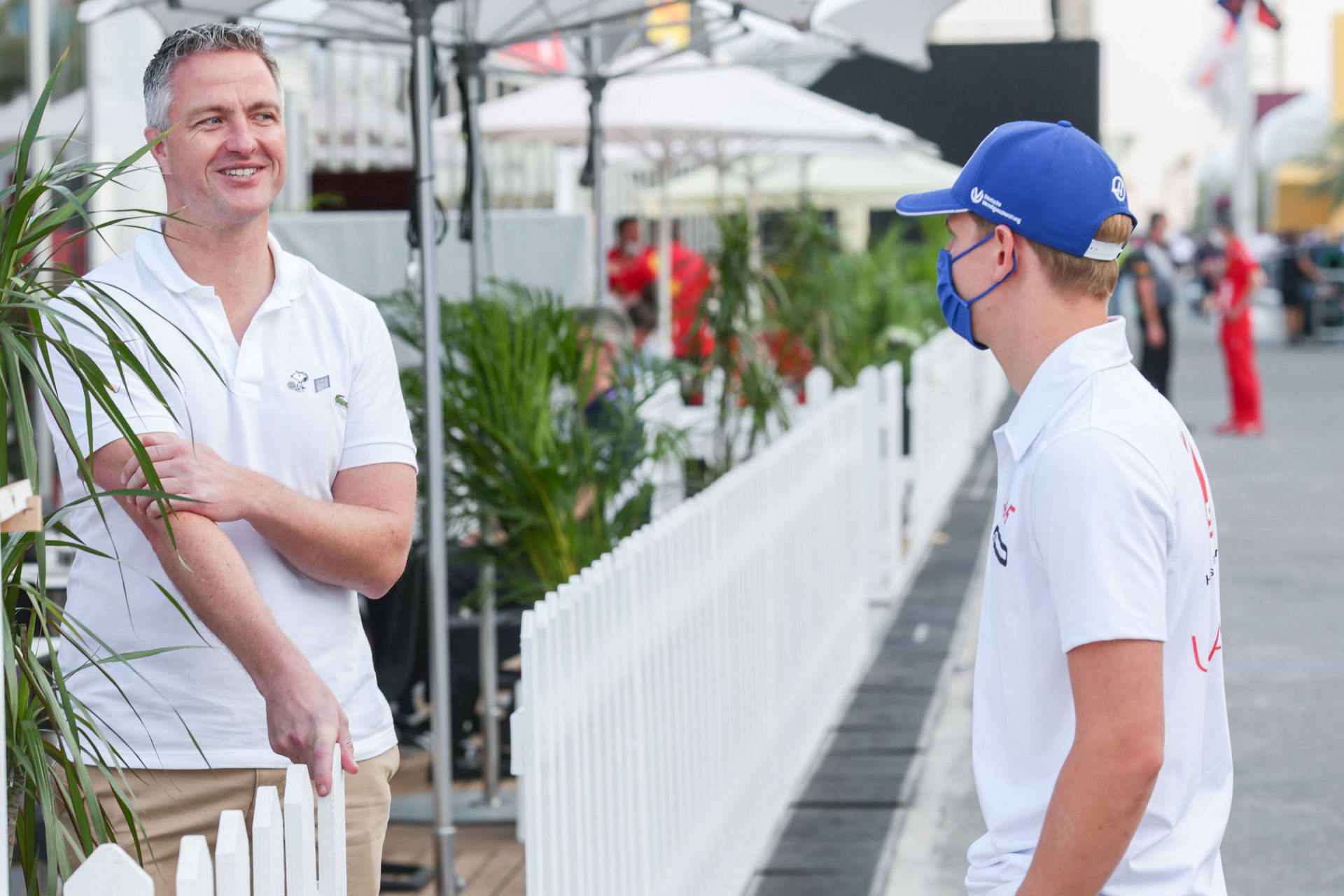 Ralf Schumacher chats with Mick Schumacher in Doha, Qatar (Photo by Peter Fox/Getty Images)