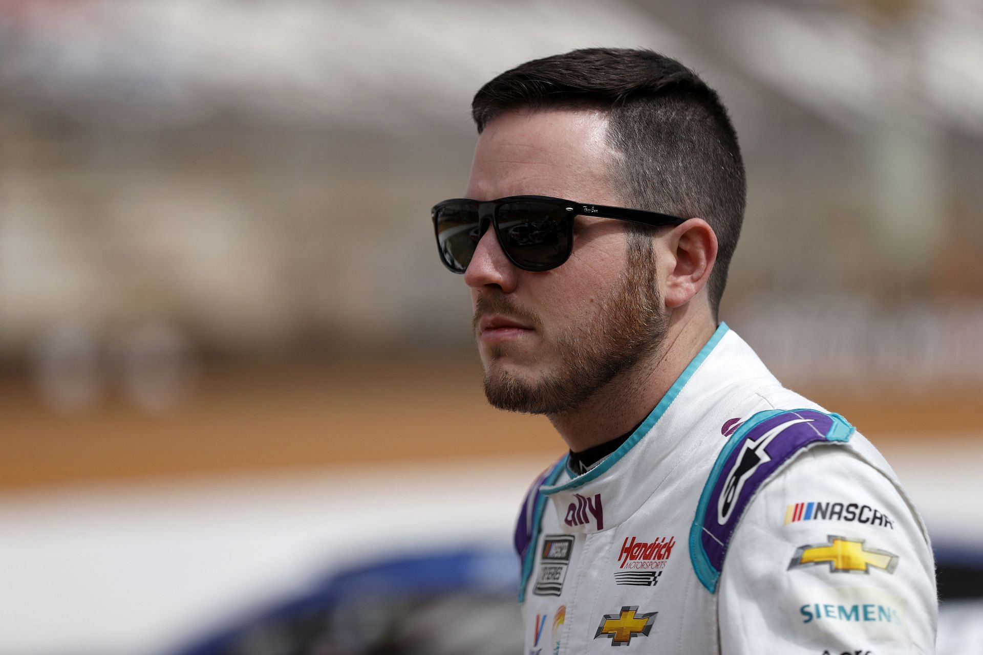 Alex Bowman looks on during first practice for the NASCAR Camping World Truck Series Pinty&#039;s Truck Race on Dirt at Bristol Motor Speedway. (Photo by Chris Graythen/Getty Images)