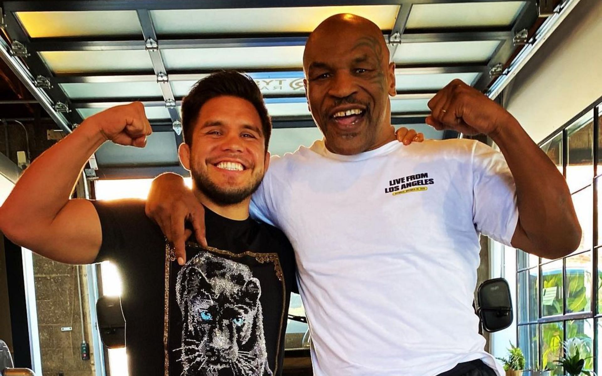 Mike Tyson (right) and Henry Cejudo (left) (Image via Twitter / @HenryCejudo)