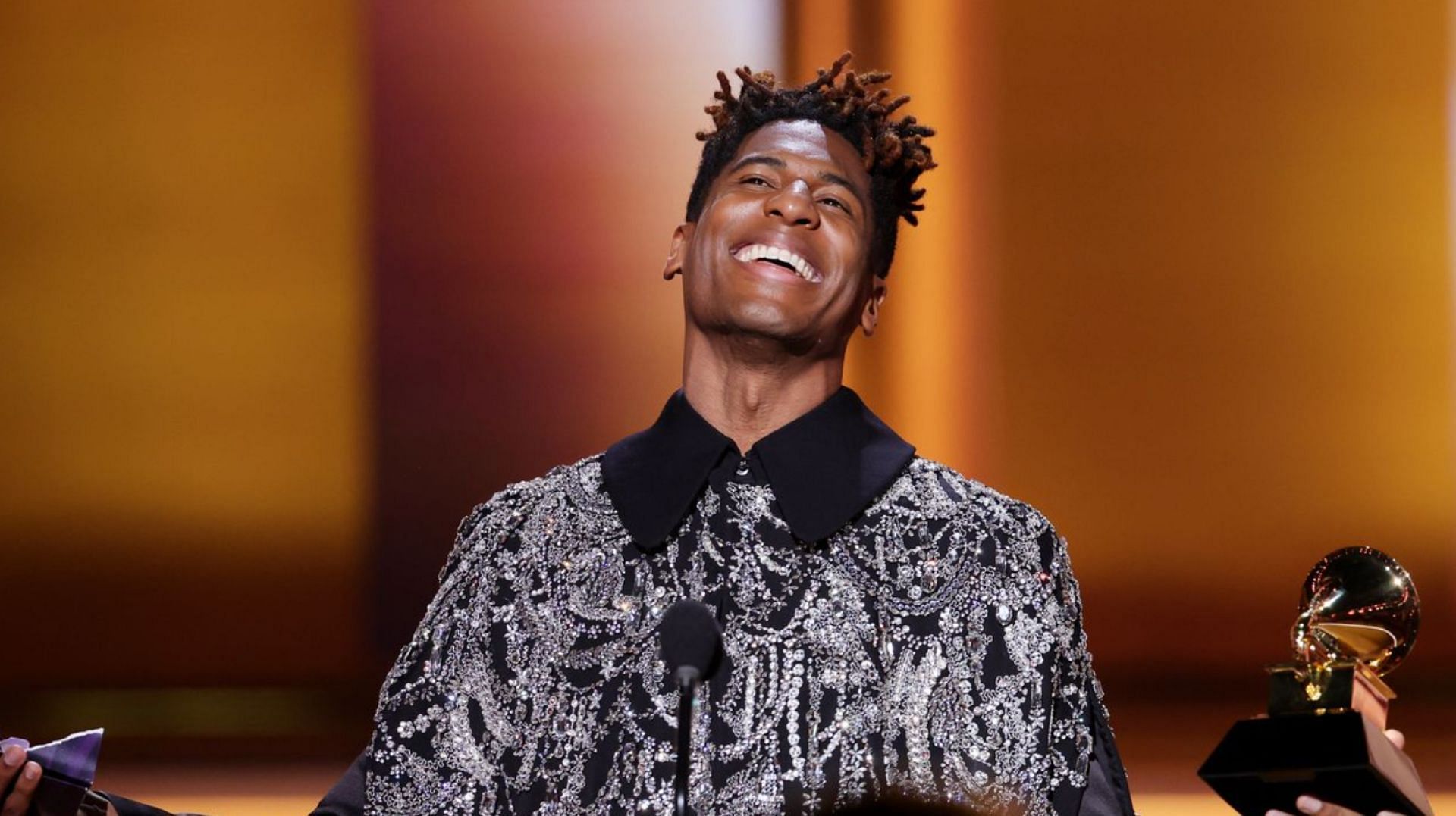An elated Batiste on the stage (Image via Rich Fury/Getty Images)