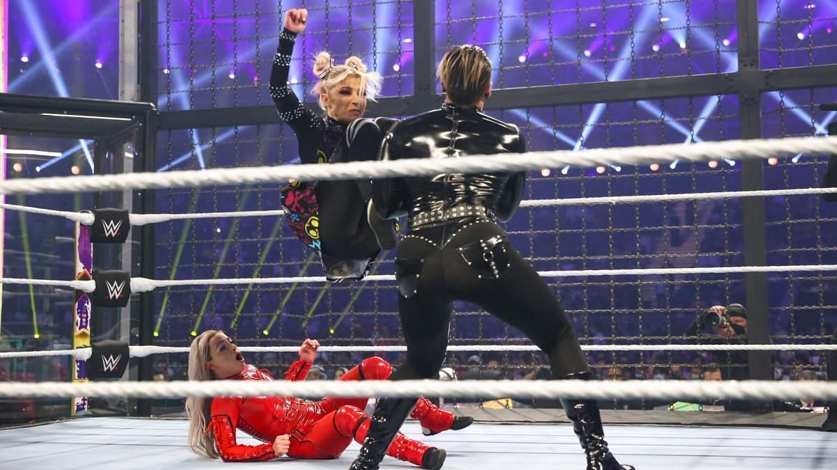 Alexa Bliss and Rhea Ripley are seen engaged in battle