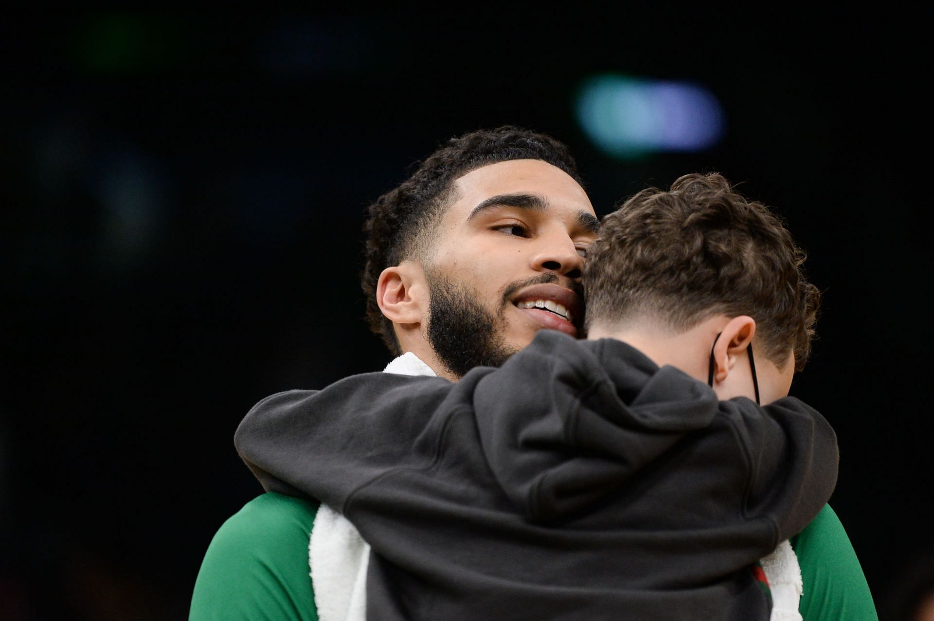 Jayson Tatum #0 of the Boston Celtics holds his son Deuce
