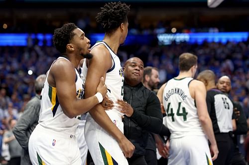 Donovan Mitchell forces Hassan Whiteside off the court after Whiteside was called for two technical fouls and ejected from the game.