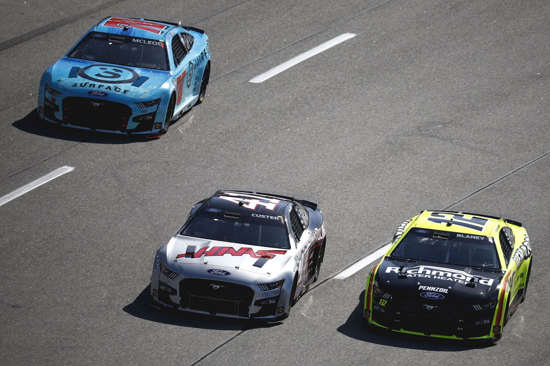 Ryan Blaney, Cole Custer, and BJ McLeod race during the NASCAR Cup Series Toyota Owners 400 at Richmond Raceway. (Photo by Jared C. Tilton/Getty Images)