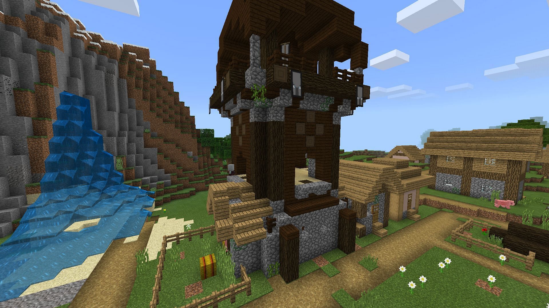 A pillager outpost spawned in the middle of a village (Image via Minecraft)