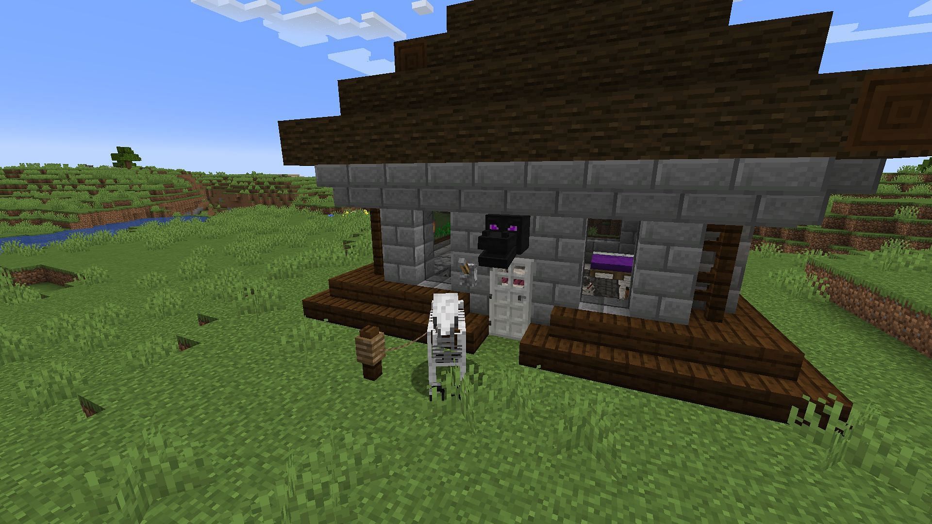 A player&#039;s base with a dragon head above the door (Image via Minecraft)