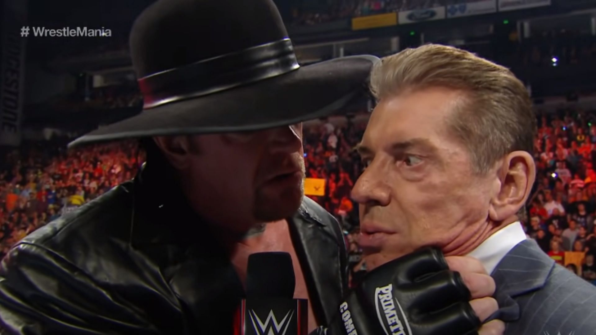 The Undertaker (left) and Vince McMahon (right)