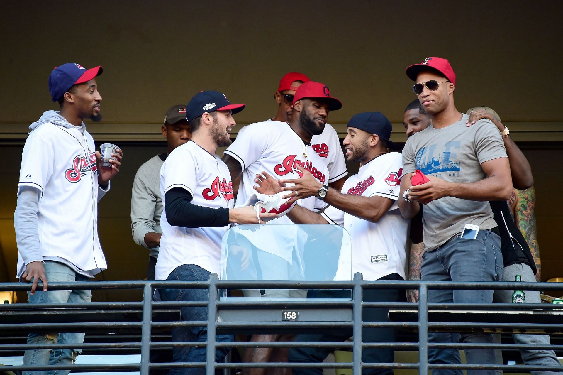 National Basketball Association Cleveland Cavaliers Richard Jefferson, Kevin Love and LeBron James joke around during game two of the American League Championship Series between the Toronto Blue Jays and the Cleveland Indians at Progressive Field on October 15, 2016 in Cleveland, Ohio.