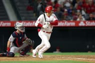 Shohei Ohtani launches a ball into the outfield against the Cleveland Guardians.