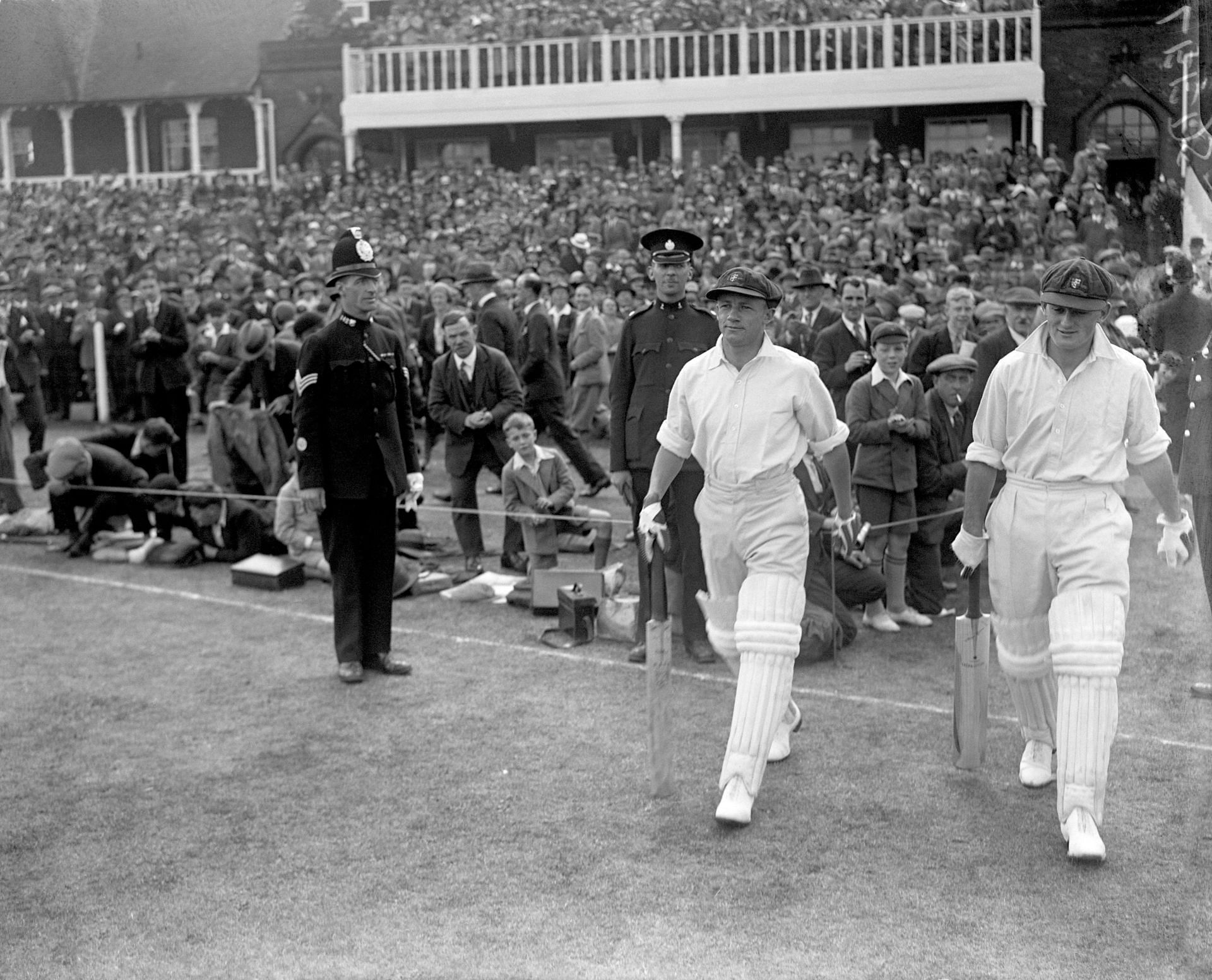 Stan McCabe (right) walking out to bat with Don Bradman in the Leeds Test of 1930