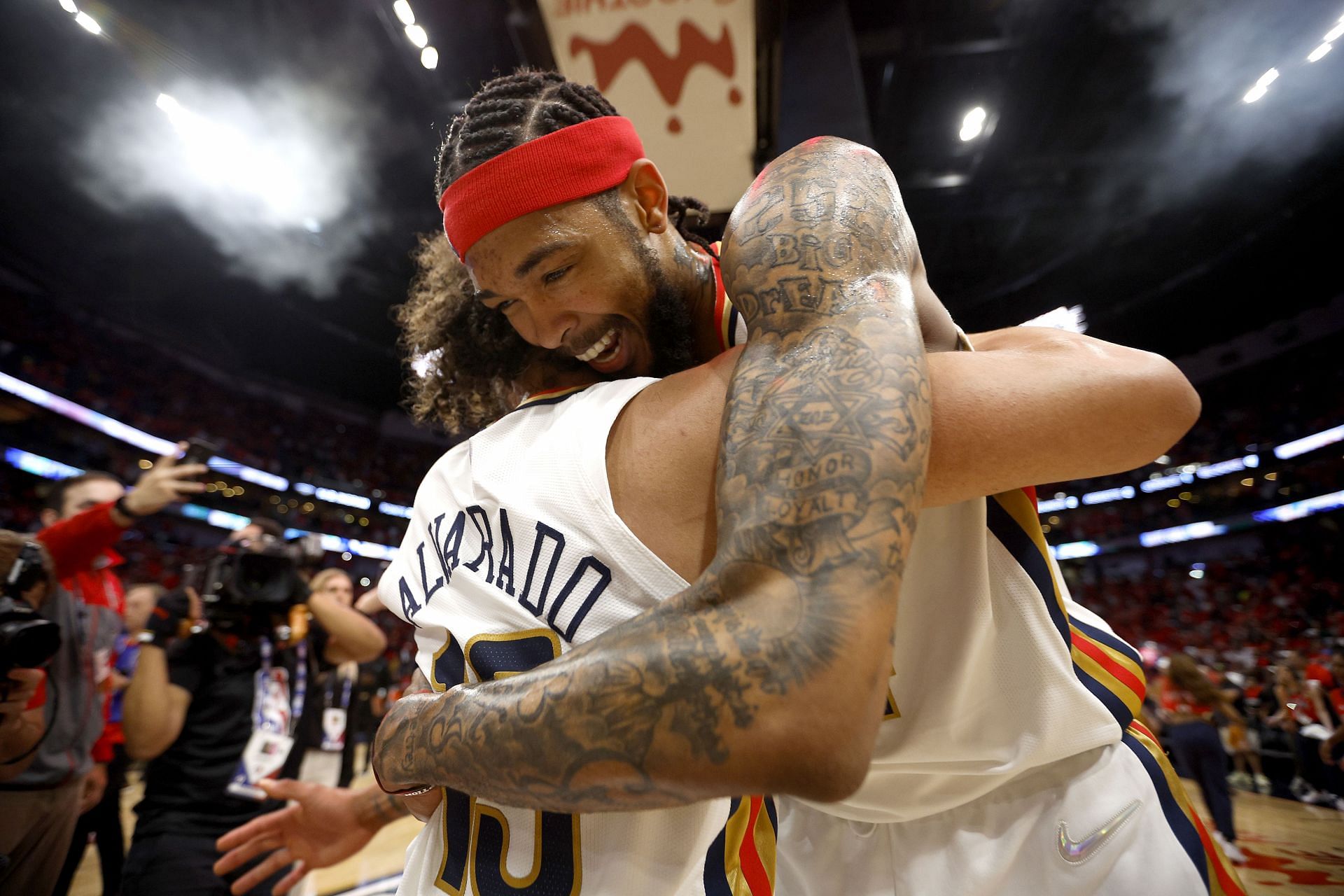 New Orleans Pelicans teammates celebrate their win