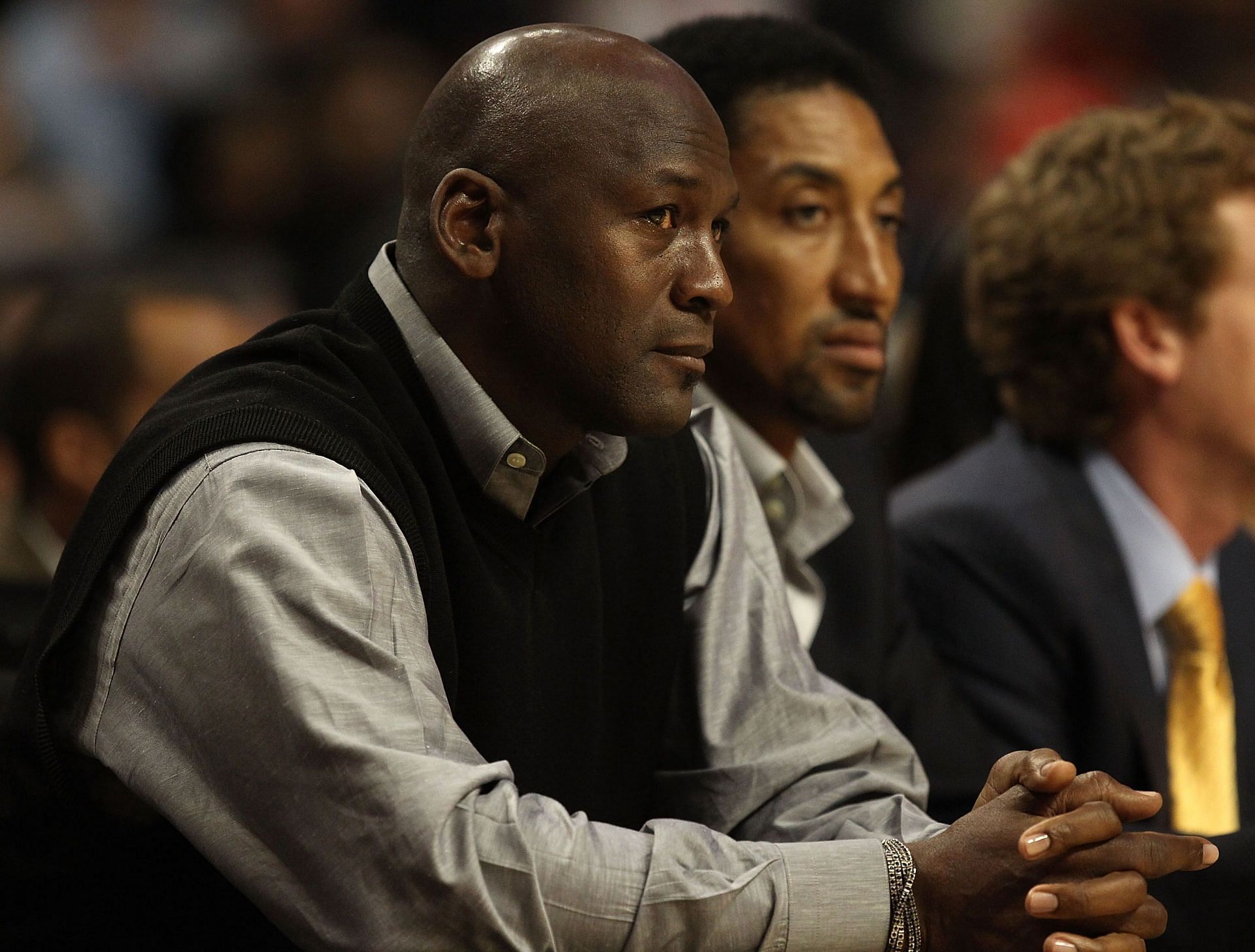 Michael Jordan and Scottie Pippen watching a game in 2011.
