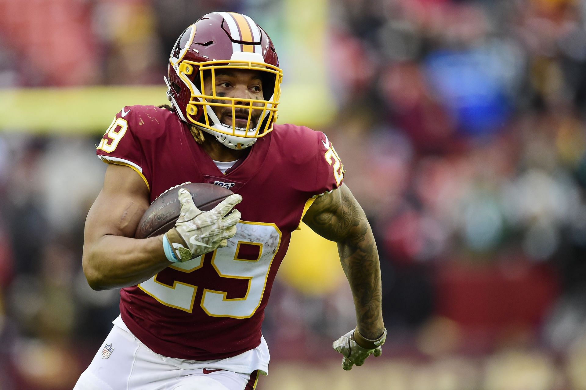 Report: Former LSU running back Derrius Guice 'becoming man of the people'  in Washington