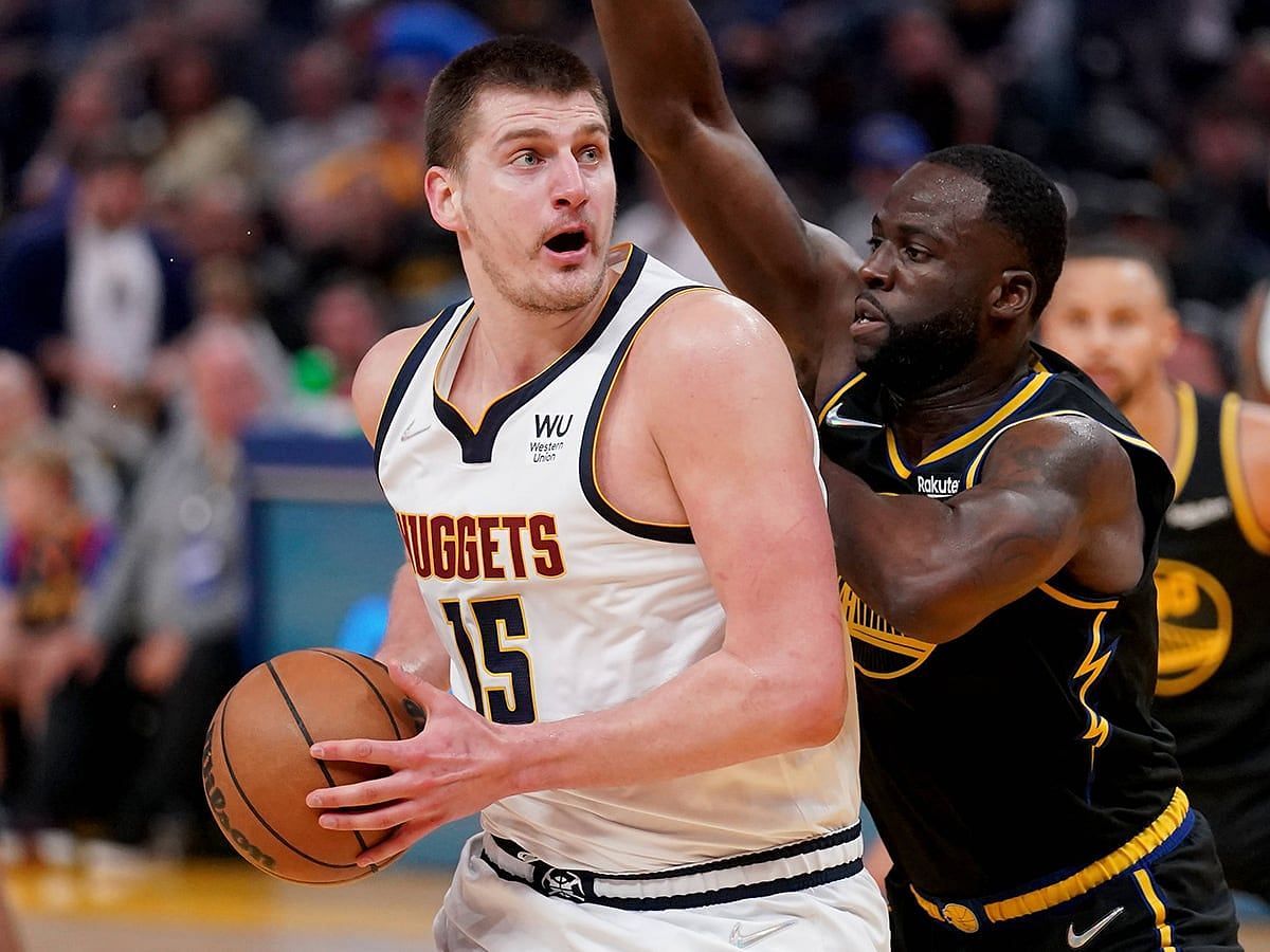 Draymond Green has significantly lessened Nikola Jokic's impact in the series between the Warriors and Nuggets. [Photo: Sports Illustrated]