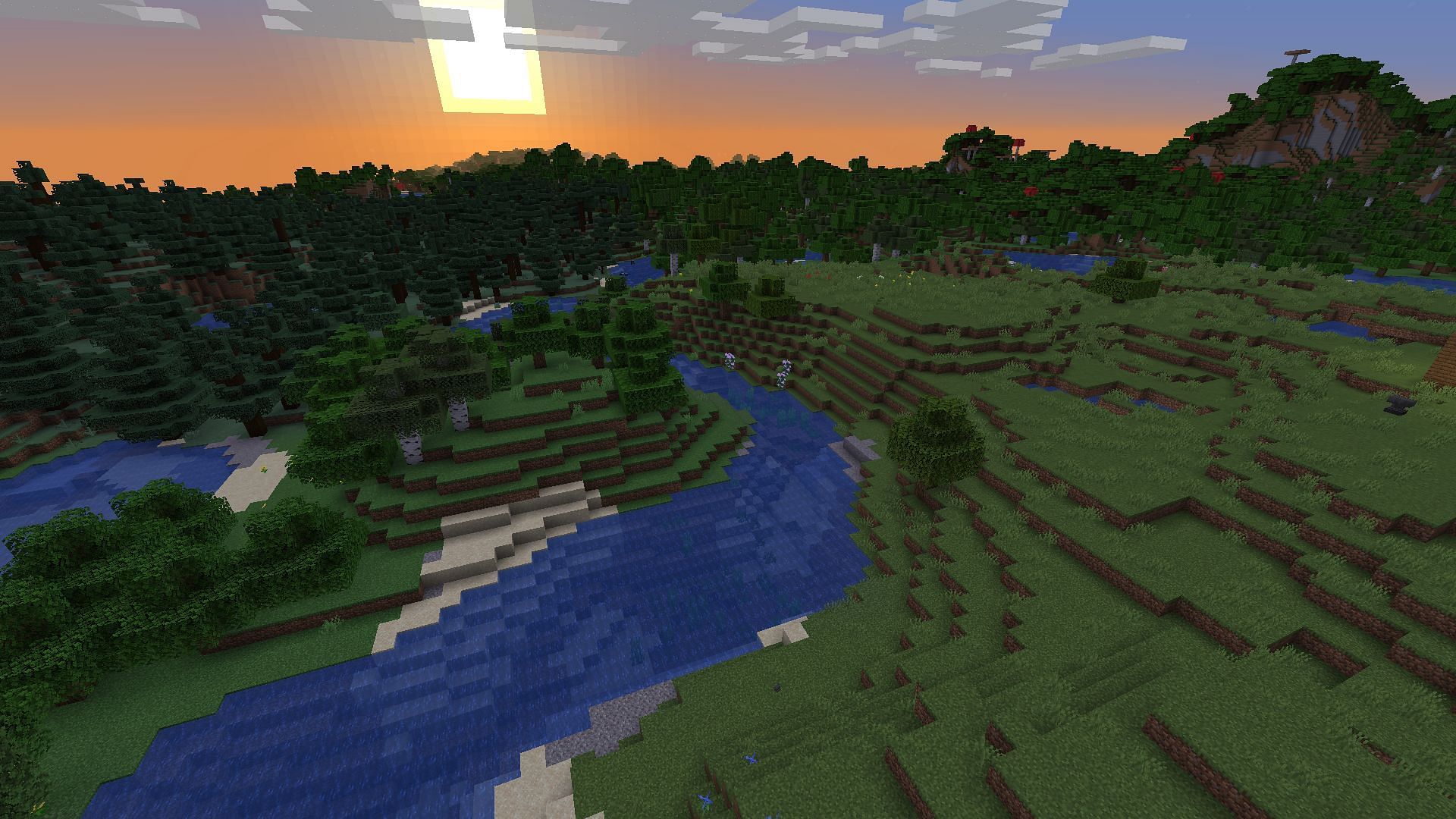 A peaceful sunset over a forest and plains river biome (Image via Minecraft)
