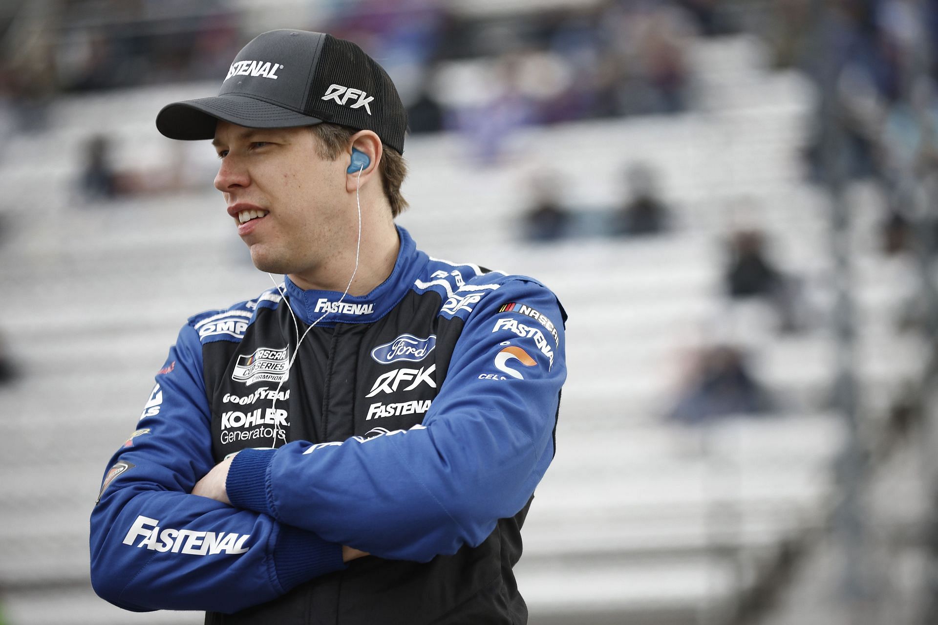 Brad Keselowski looks on during qualifying for the NASCAR Cup Series Blue-Emu Maximum Pain Relief 400 at Martinsville Speedway.