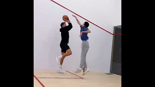 Tom Brady showcasing his basketball skills